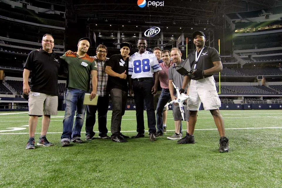 Ryan Trenhaile and the team on the field at a stadium